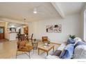 Bright, open-concept living area with hardwood floors and modern decor at 1460 Quince Ave # 102, Boulder, CO 80304