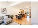 Open concept living space with dining area, flowing into modern kitchen at 2302 Spruce St, Boulder, CO 80302