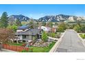 Beautiful home showcasing professionally landscaped yard and Flatirons mountain views in Boulder, Colorado at 2790 Stanford Ave, Boulder, CO 80305