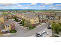 Community aerial view showcases well-maintained landscaping, and ample parking at 12820 King St, Broomfield, CO 80020