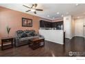 Comfortable living area with an open layout to the kitchen at 16058 E Elk Dr, Denver, CO 80239