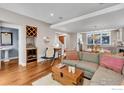 Open-concept living space features hardwood floors and lots of natural light at 2050 Walnut St, Boulder, CO 80302
