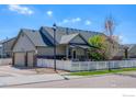 Features a covered patio area perfect for entertaining at 2196 Winding Dr, Longmont, CO 80504