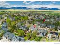 Panoramic aerial view showcasing the property's location with mountain views and proximity to Pocket Park at 2822 Flint Ct, Superior, CO 80027