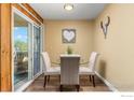 Charming dining area features a glass table and access to outdoor seating at 3030 Oneal Pkwy # 18, Boulder, CO 80301