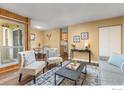 Open-concept living room leading to dining area and kitchen with natural light at 3030 Oneal Pkwy # 18, Boulder, CO 80301