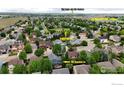 A neighborhood aerial view shows proximity to Coal Ridge Middle School, neighborhood parks, and local businesses at 5822 Shenandoah Ave, Firestone, CO 80504