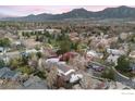 Scenic aerial view of the neighborhood with mountain views in the background at 1424 Kennedy Ct, Boulder, CO 80303