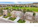 An aerial view showcases the property's lush landscaping and serene neighborhood setting at 2926 Castle Peak Ave, Superior, CO 80027