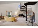 Bright living room with a spiral staircase and a piano at 6611 Lakeview Dr, Boulder, CO 80303