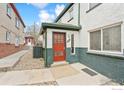 Welcoming entrance with a red door and clean walkway at 961 16Th St # 4, Boulder, CO 80302