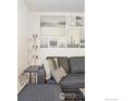Cozy living room featuring neutral decor, comfortable seating, and stylish artwork at 961 16Th St # 4, Boulder, CO 80302