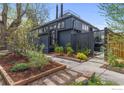 Beautifully landscaped exterior with a walkway, modern design, and lush greenery adding to its curb appeal at 1635 6Th St, Boulder, CO 80302