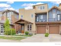 Inviting two-story townhouse with well-manicured lawn, covered porch, and attached two-car garage at 3714 Ridgeway St, Boulder, CO 80301