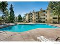 Relaxing community pool with comfortable lounge chairs, creating a perfect spot for leisurely days at 3035 Oneal Pkwy # T, Boulder, CO 80301