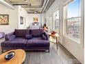 Open-concept layout with a living room and bedroom with lots of natural light at 3401 Arapahoe Ave # 402, Boulder, CO 80303