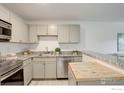 Kitchen featuring stainless steel appliances, granite counters, and modern cabinetry at 5120 Williams Fork Trl # 210, Boulder, CO 80301