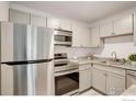 Kitchen featuring stainless steel appliances and modern cabinetry at 5120 Williams Fork Trl # 210, Boulder, CO 80301