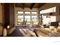 A brightly lit main bedroom featuring a fireplace, hardwood floors, a sitting area and mountain views at 9578 Mountain Ridge Dr, Boulder, CO 80302