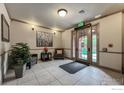 Inviting lobby with neutral decor, seating, and artwork, creating a welcoming atmosphere at 1379 Charles Dr # 4, Longmont, CO 80503