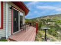 Inviting deck space with outdoor seating, perfect for enjoying the surrounding natural beauty and views at 1629 Gold Run Rd, Boulder, CO 80302