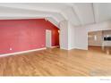 Bright, spacious living room featuring hardwood floors, high ceilings and fresh, neutral paint at 1629 Timber Ln, Boulder, CO 80304