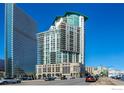Modern high-rise building showcasing unique architecture and a vibrant cityscape at 2001 Lincoln St # 2113, Denver, CO 80202