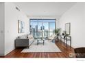 Modern living room with city views, natural light, and an open floor plan at 2001 Lincoln St # 2113, Denver, CO 80202
