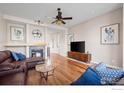 Inviting living room features hardwood floors, a fireplace, and stylish furniture, perfect for relaxation at 3734 Ridgeway St, Boulder, CO 80301