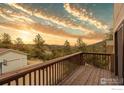Expansive wooden deck offers stunning mountain views and plenty of space for outdoor enjoyment at 473 Fred St, Boulder, CO 80302