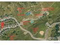 An aerial view highlights community amenities like parks, baseball fields, basketball, and walking trails at 7281 Arco Iris Ln, Castle Pines, CO 80108