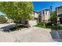 Charming multi-story home with a well-maintained exterior and attached two-car garage at 13024 Grant E Cir, Thornton, CO 80241