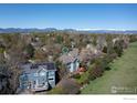 Aerial view highlighting a backyard with a spacious deck, ideal for outdoor enjoyment at 1809 Keel Ct, Lafayette, CO 80026