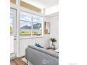 Comfortable living room with mountain views, modern decor, and neutral color palette at 1707 Walnut St # 306, Boulder, CO 80302