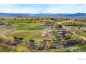 Expansive aerial view of property showcasing picturesque landscapes and mountain views at 2548 Horseshoe Cir, Longmont, CO 80504
