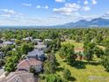 Scenic aerial view of the neighborhood and distant mountains at 4059 Nevis St, Boulder, CO 80301