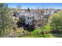 Stunning backyard featuring a spacious deck and garden at 4059 Nevis St, Boulder, CO 80301