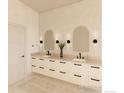 Elegant bathroom featuring double sinks with arched mirrors, modern fixtures, and stylish tile accents at 2941 21St St, Boulder, CO 80301