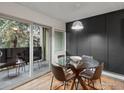 View of a private balcony with outdoor seating accessible from the dining area at 3335 Chisholm Trl # 202, Boulder, CO 80301