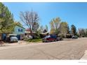 This home features a well-manicured front yard and an attractive exterior, nestled in a peaceful residential neighborhood at 470 Ash St, Broomfield, CO 80020