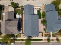 Overhead view of neighborhood homes with well-maintained yards and ample parking at 569 Jackson St, Lafayette, CO 80026
