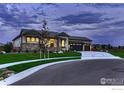 Charming single-Gathering home with a manicured lawn and a three-car garage at 685 Quarry Ct, Erie, CO 80516
