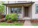 Charming home exterior with well-maintained landscaping and a welcoming front porch area at 812 E Baseline Rd # A, Lafayette, CO 80026