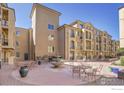 Charming courtyard with fountain and seating, perfect for outdoor relaxation and socializing at 4500 Baseline Rd # 4402, Boulder, CO 80303