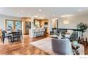 Spacious open-concept living space with a modern kitchen and dining area at 2550 Woodstock Pl, Boulder, CO 80305