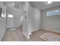 Bright living space with sleek floors and neutral decor, perfect for modern living at 390 Blackfoot St, Superior, CO 80027