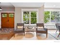 Cozy living room area with large windows and comfortable seating at 3059 6Th St, Boulder, CO 80304
