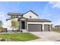 Charming two-story home with a three-car garage and a modern farmhouse design at 5900 Sunrise Pl, Longmont, CO 80504