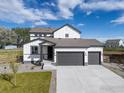 Charming two-story home with a three-car garage and a modern farmhouse design at 5900 Sunrise Pl, Longmont, CO 80504