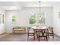 Bright dining area with modern table and chairs, perfect for Gathering meals at 725 Arrowood St, Longmont, CO 80503